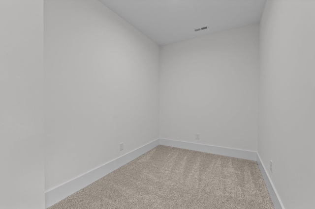 unfurnished room featuring carpet flooring