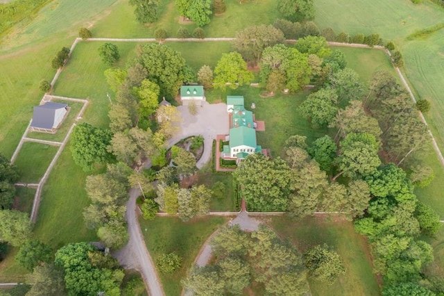 birds eye view of property featuring a rural view