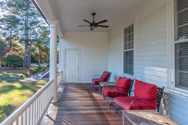 wooden terrace with ceiling fan