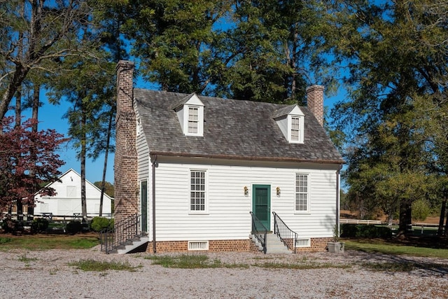 back of property featuring central AC unit