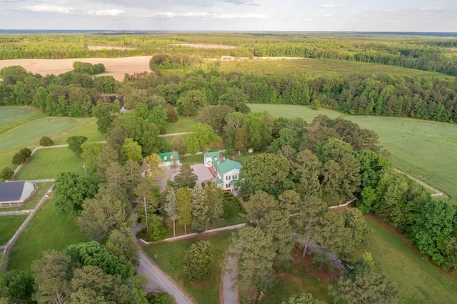 birds eye view of property with a rural view