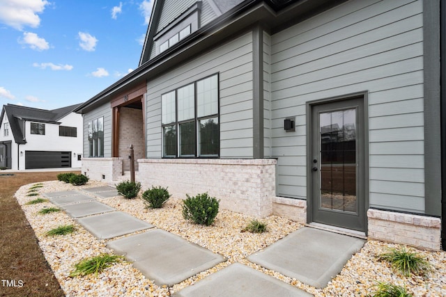 property entrance featuring a garage