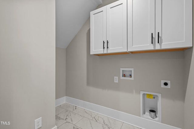 laundry room featuring light tile flooring, cabinets, hookup for an electric dryer, and hookup for a washing machine