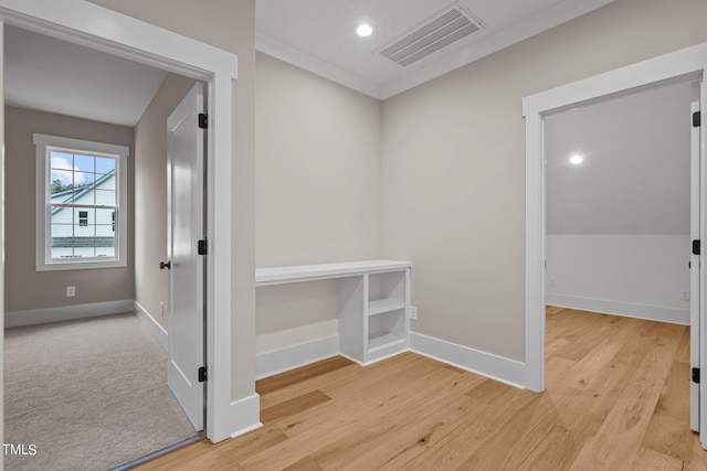 hallway with light wood-type flooring