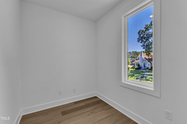 2601 Mayview Rd, Raleigh, NC 27607 - spare room featuring baseboards and wood finished floors