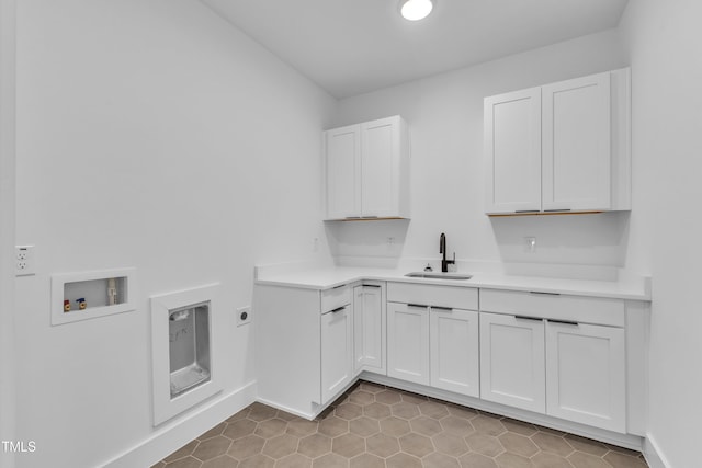 2601 Mayview Rd, Raleigh, NC 27607 - laundry room with cabinet space, a sink, washer hookup, light tile patterned floors, and hookup for an electric dryer