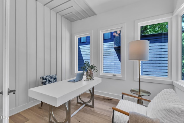 2601 Mayview Rd, Raleigh, NC 27607 - home office featuring baseboards, visible vents, wood finished floors, and a wealth of natural light