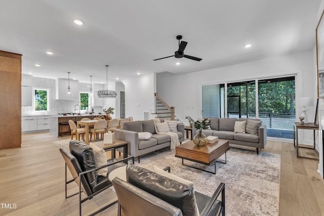 2601 Mayview Rd, Raleigh, NC 27607 - living area with recessed lighting, ceiling fan, light wood finished floors, and stairs