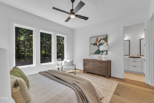 2601 Mayview Rd, Raleigh, NC 27607 - bedroom with a ceiling fan, ensuite bath, and light wood-style flooring
