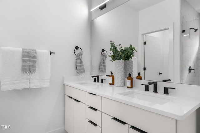 bathroom with a shower and vanity