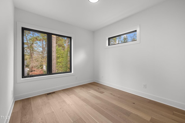 empty room with light wood-type flooring