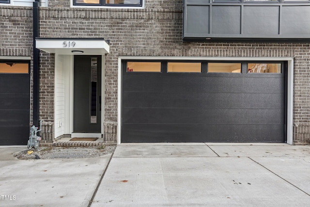 view of exterior entry featuring a garage