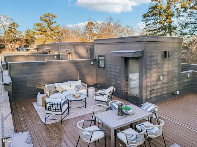 wooden deck with an outdoor hangout area