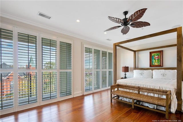 bedroom featuring crown molding, ceiling fan, hardwood / wood-style floors, and access to outside