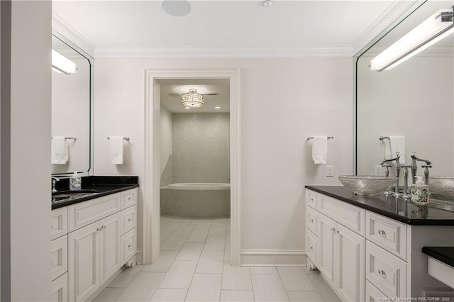 bathroom with ornamental molding, tile patterned floors, and vanity