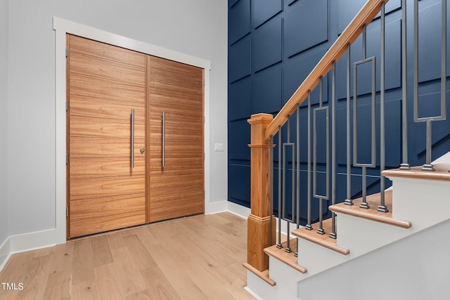 entrance foyer with light wood-type flooring