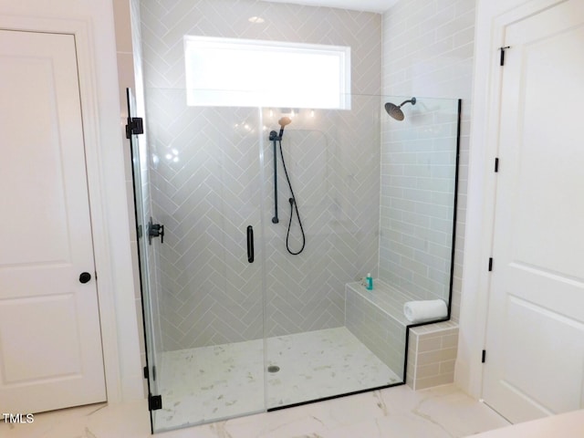 bathroom with an enclosed shower