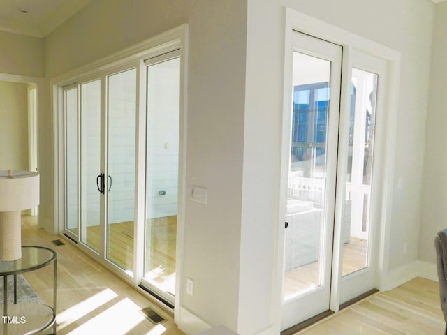 doorway featuring light wood-type flooring