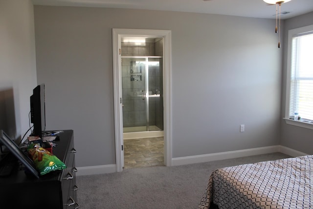 tiled bedroom featuring ensuite bathroom