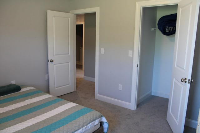 bedroom with light colored carpet