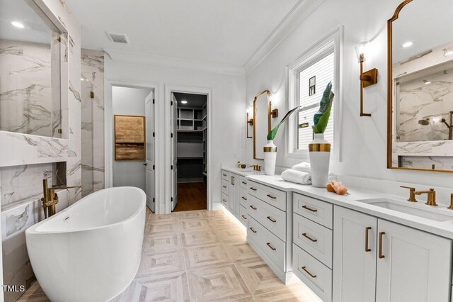 bathroom featuring crown molding, vanity, and plus walk in shower