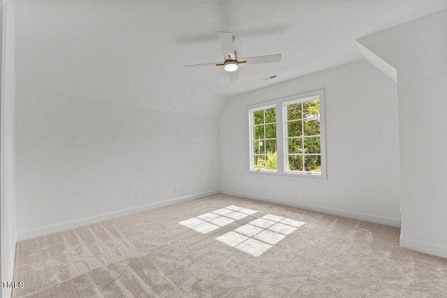 bonus room featuring light colored carpet, ceiling fan, and lofted ceiling