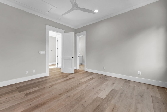 empty room with crown molding, ceiling fan, and light hardwood / wood-style flooring