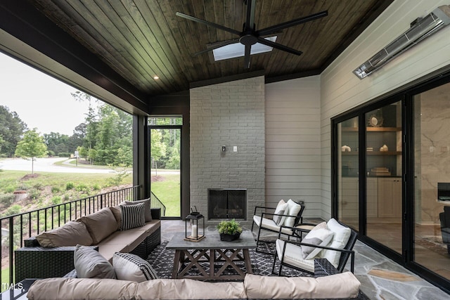 view of patio with outdoor lounge area and ceiling fan