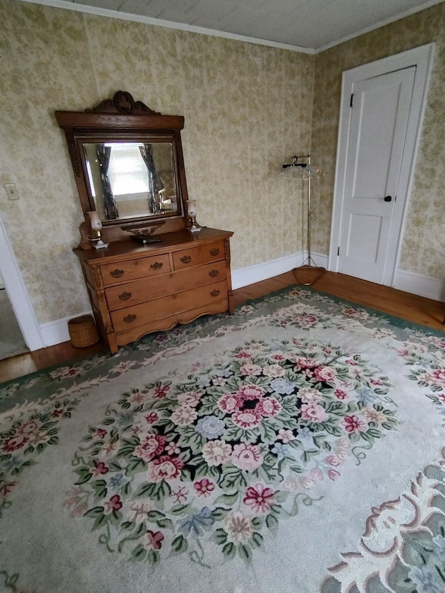 interior space featuring crown molding and dark hardwood / wood-style flooring