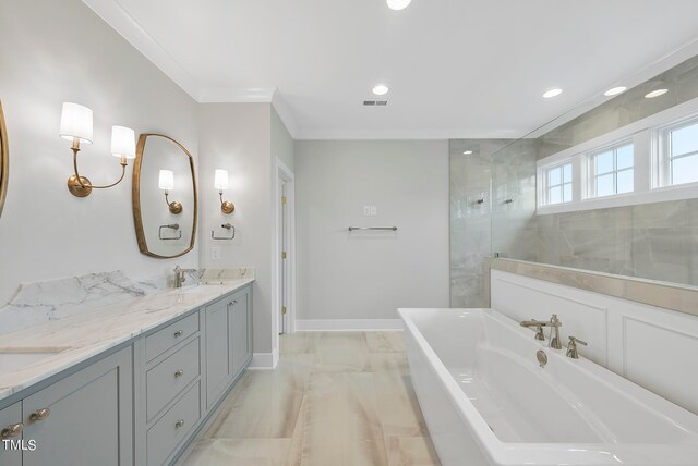 bathroom with ornamental molding, vanity, and shower with separate bathtub