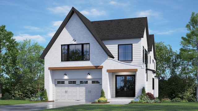 view of front of home featuring a front yard and a garage