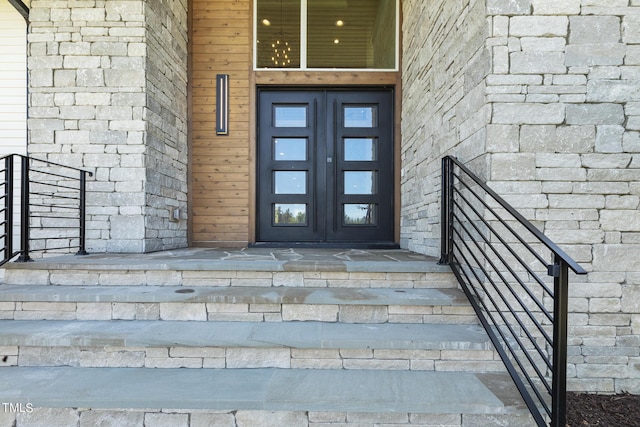 view of exterior entry with stone siding