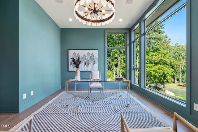 office with recessed lighting, visible vents, an inviting chandelier, wood finished floors, and baseboards