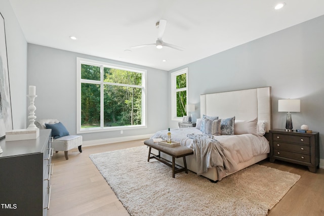 bedroom featuring light wood-style flooring and recessed lighting