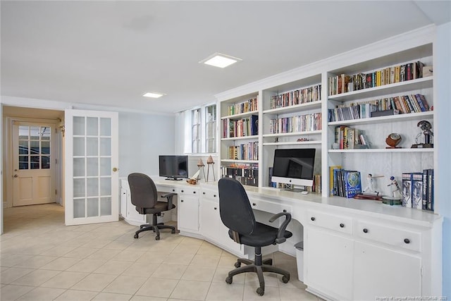 tiled office space featuring built in desk