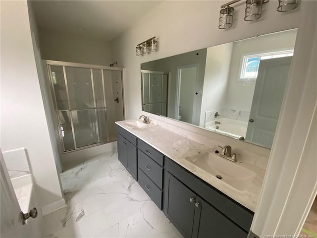 bathroom with vanity and separate shower and tub