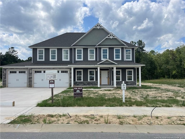 view of front of property featuring a garage