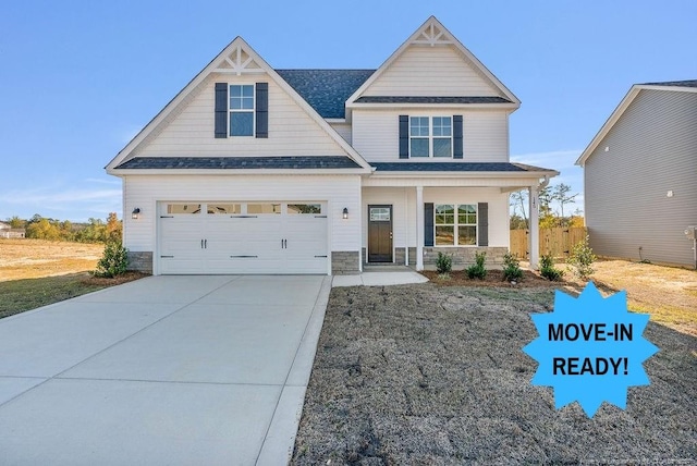 craftsman-style home with a porch and a garage