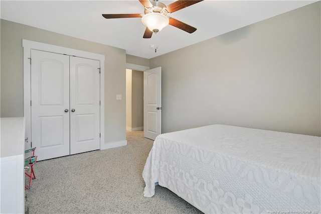 bedroom with a closet and ceiling fan