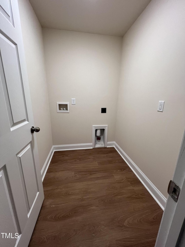 washroom with dark hardwood / wood-style flooring and hookup for a washing machine