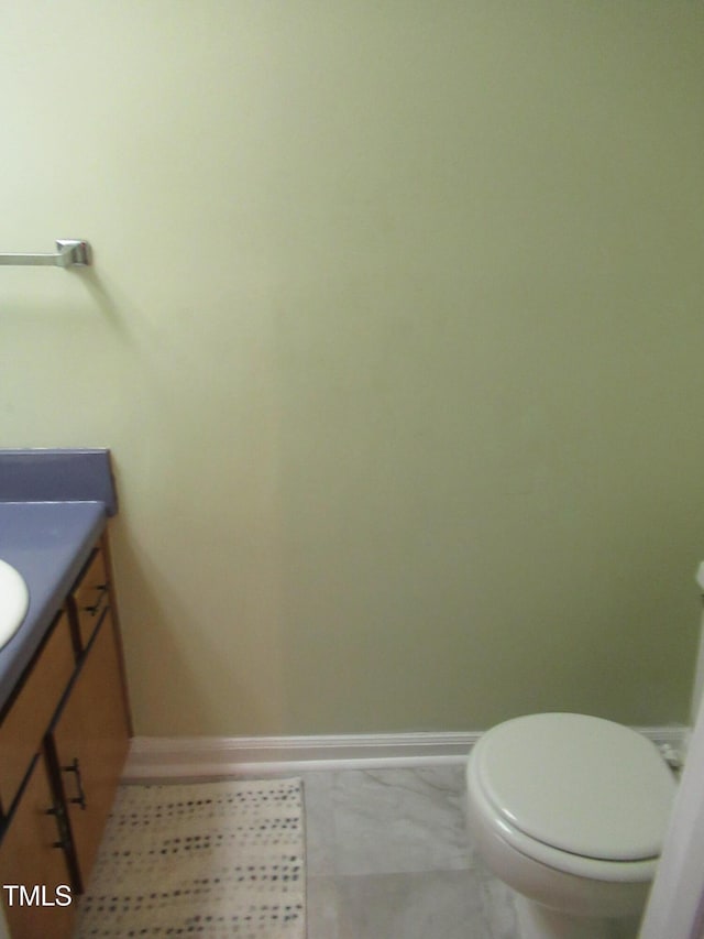 139 Kingsbury Dr, Chapel Hill, NC 27514 - half bathroom featuring toilet, vanity, and baseboards
