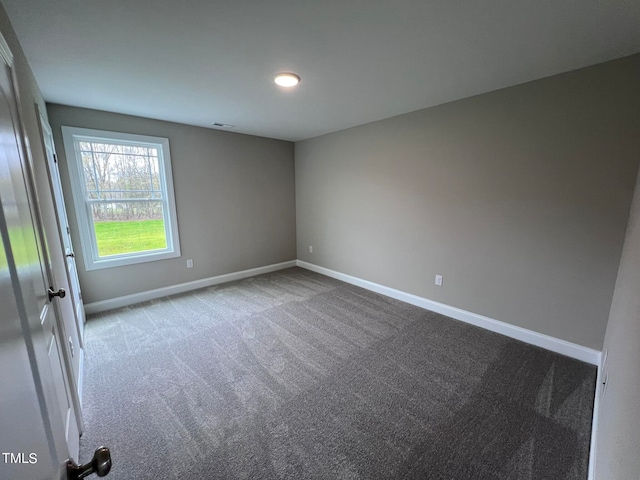 empty room featuring carpet