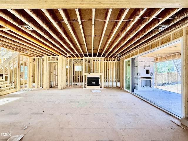 unfurnished living room with visible vents