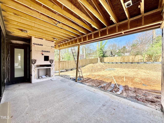 view of patio / terrace featuring fence