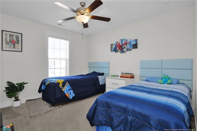 bedroom featuring carpet and ceiling fan