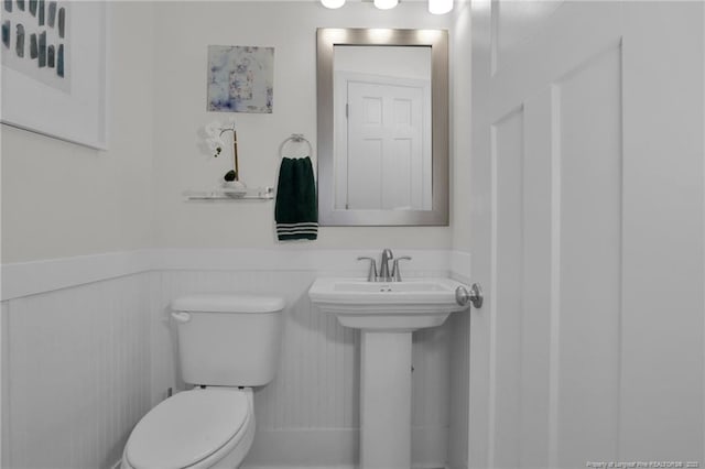 bathroom with toilet and sink