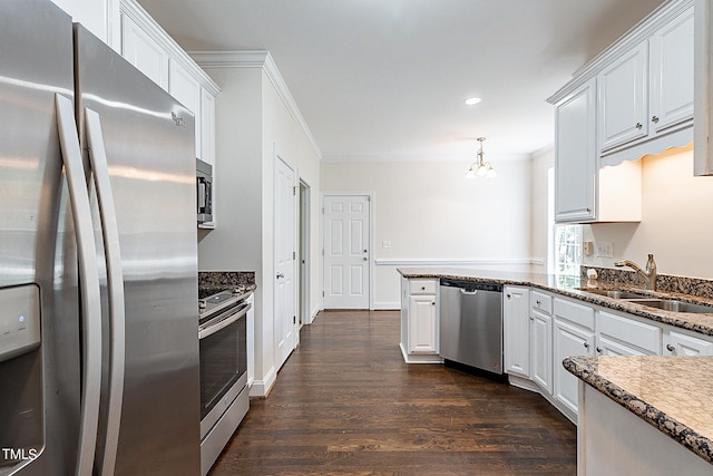 kitchen featuring white cabinets, dark hardwood / wood-style floors, and stainless steel appliances