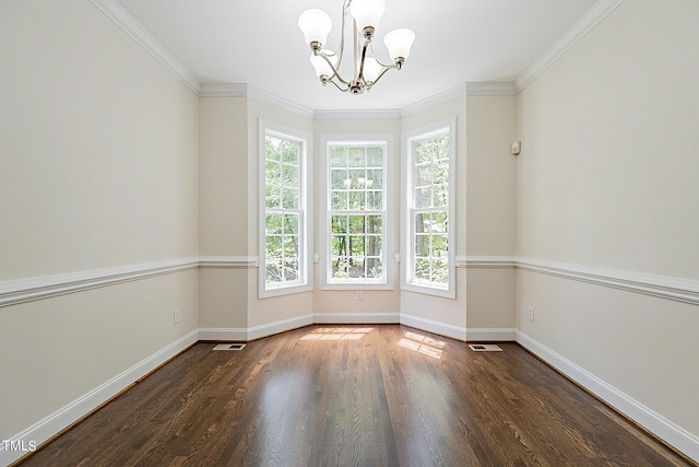 unfurnished room featuring ornamental molding, plenty of natural light, and dark hardwood / wood-style flooring