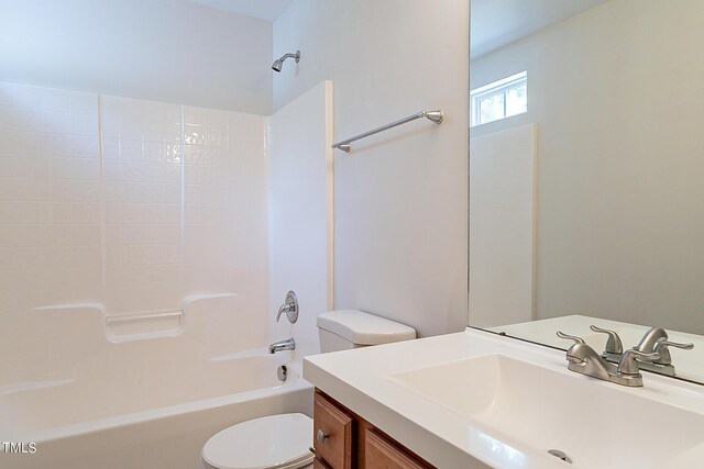 full bathroom featuring shower / bath combination, toilet, and vanity