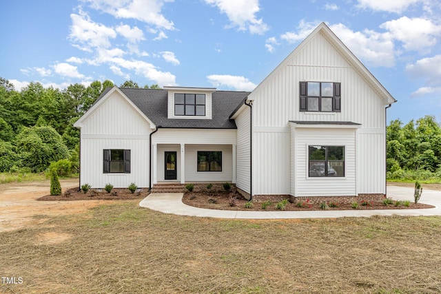 7327 Shawan Rd, Wendell, NC 27591 - modern farmhouse style home with roof with shingles, board and batten siding, and a front lawn